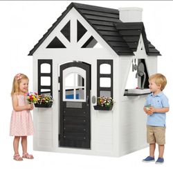 Kids Outdoor Playhouse Wooden Play House with Play Kitchen,Doorbell
Toddler Playhouse for Kids Ages 3+ with Pet Door,Snack Bar,Toy Mail Slot,Flo