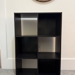 Black cube storage shelf