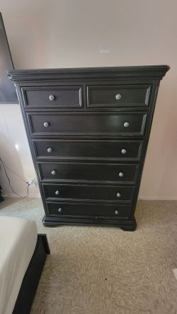 Dark mahogany dresser draw.