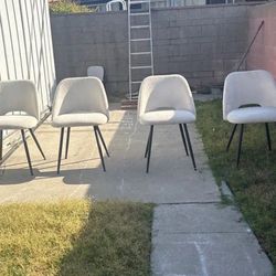 Set of 4 Sleek White Modern Chairs with Black Legs