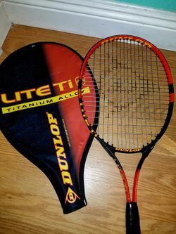 Dunlop Tennis Rackett with cover.....Awesome Tennis rackett..Great Condition!