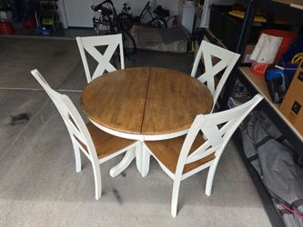 Hardwood dining table and chairs.