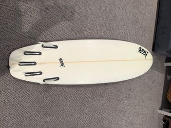 Outcast Surfboard with Fins