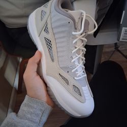 Jordan, 11 Grey and white with carbon size 10
