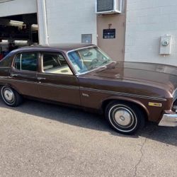 Interested In buying 1973-74 Brown 4 Door Chevy Nova 