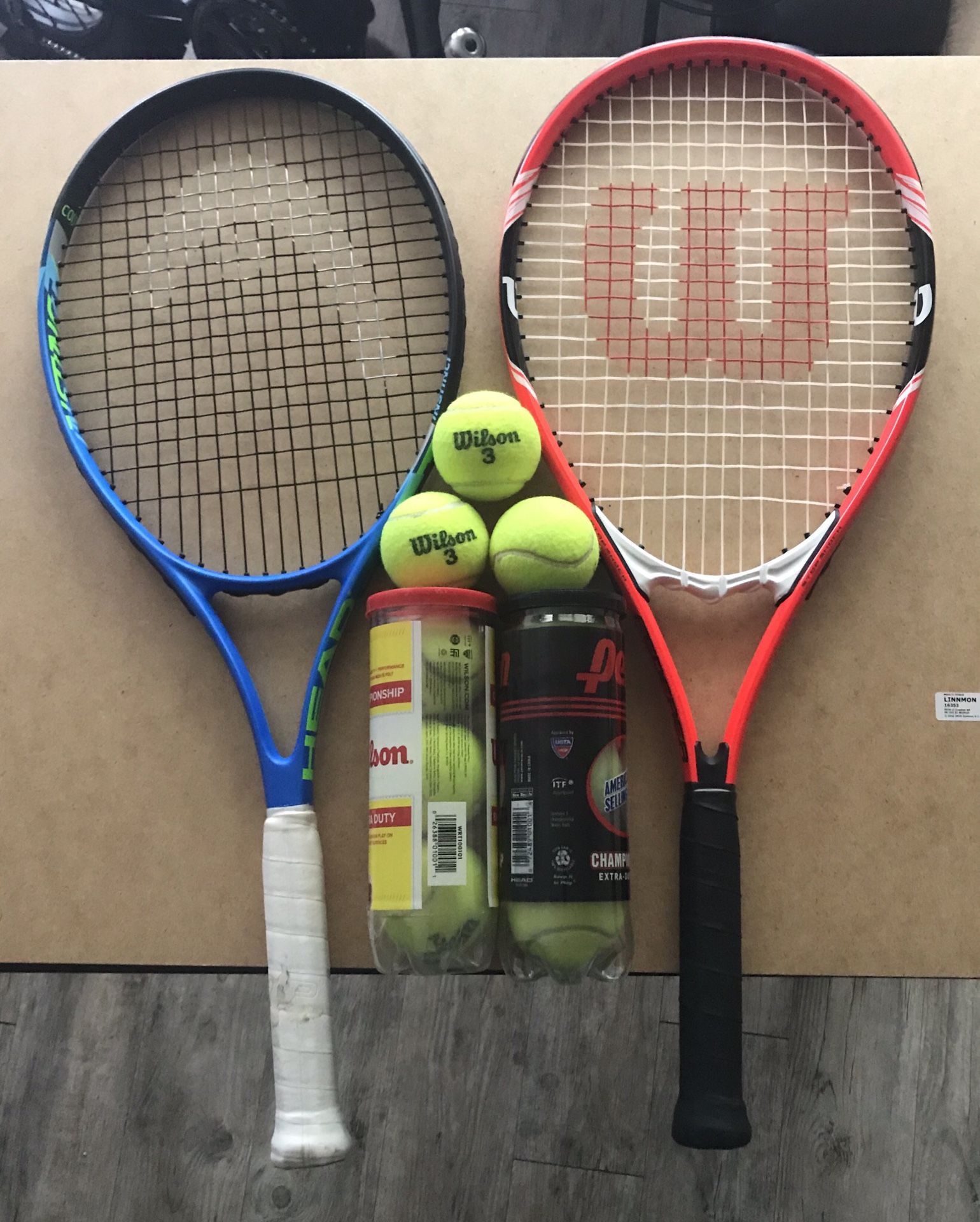 Two tennis rackets &8 tennis balls