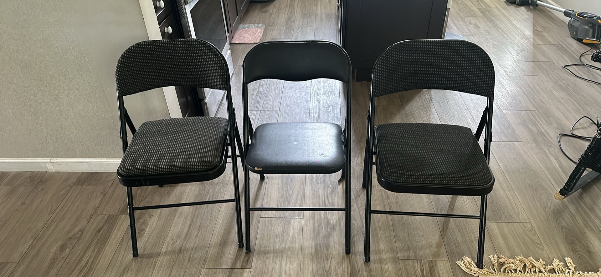3 Black Foldable chairs - 2 matching