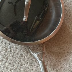 Three Calphalon Skillets.  One Lid.