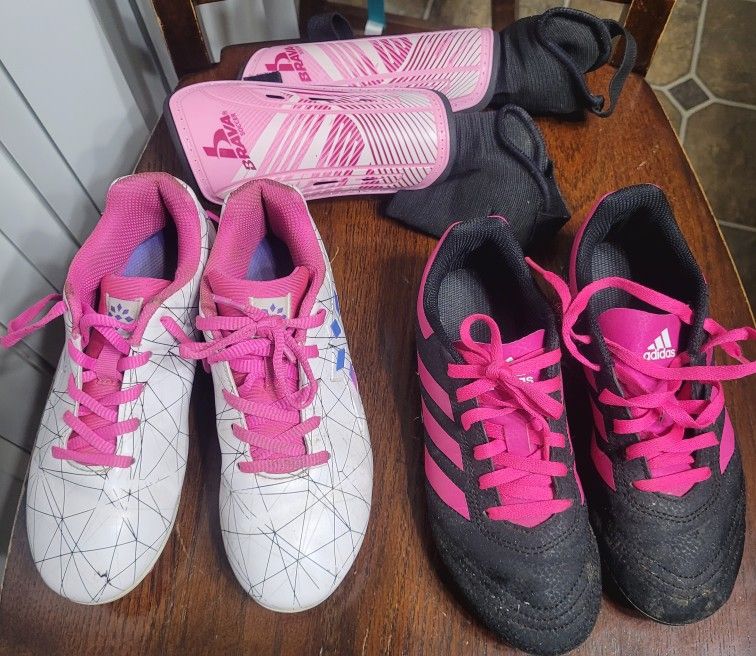 Girls soccer cleats and shin guards