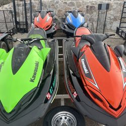 (1) Kawasaki Ultra 310R and 4 Place Trailer