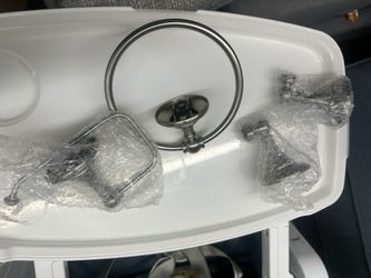 Moen Banbury 3-piece bath accessory kit in a brushed nickel finish.