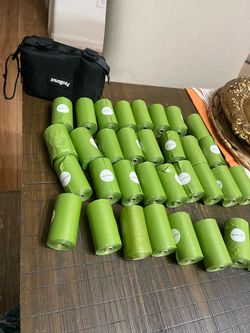 Doggy poop bags and bag holder everything new