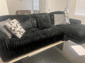 Living room, black couches