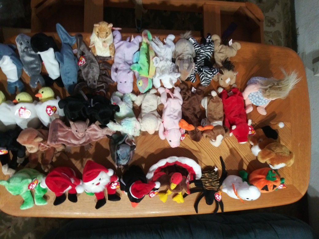 36 Beanie Babies. New with tags! Snort + more!