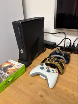 Xbox 360 S with 3 controllers