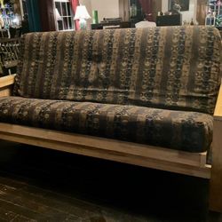 Futon classic hardwood frame with mission style arms.Queen size.