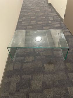 Glass center table.(47”c26”x18”)