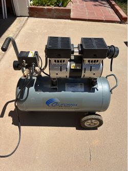 California Air Tools 6310 Ultra Quiet & Oil-Free Air Compressor (specifically with a 6.3-gallon steel tank and a 1 HP motor).