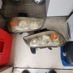02 Maxima Headlights 