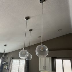 2  West Elm “Sculptural Globe” Pendants