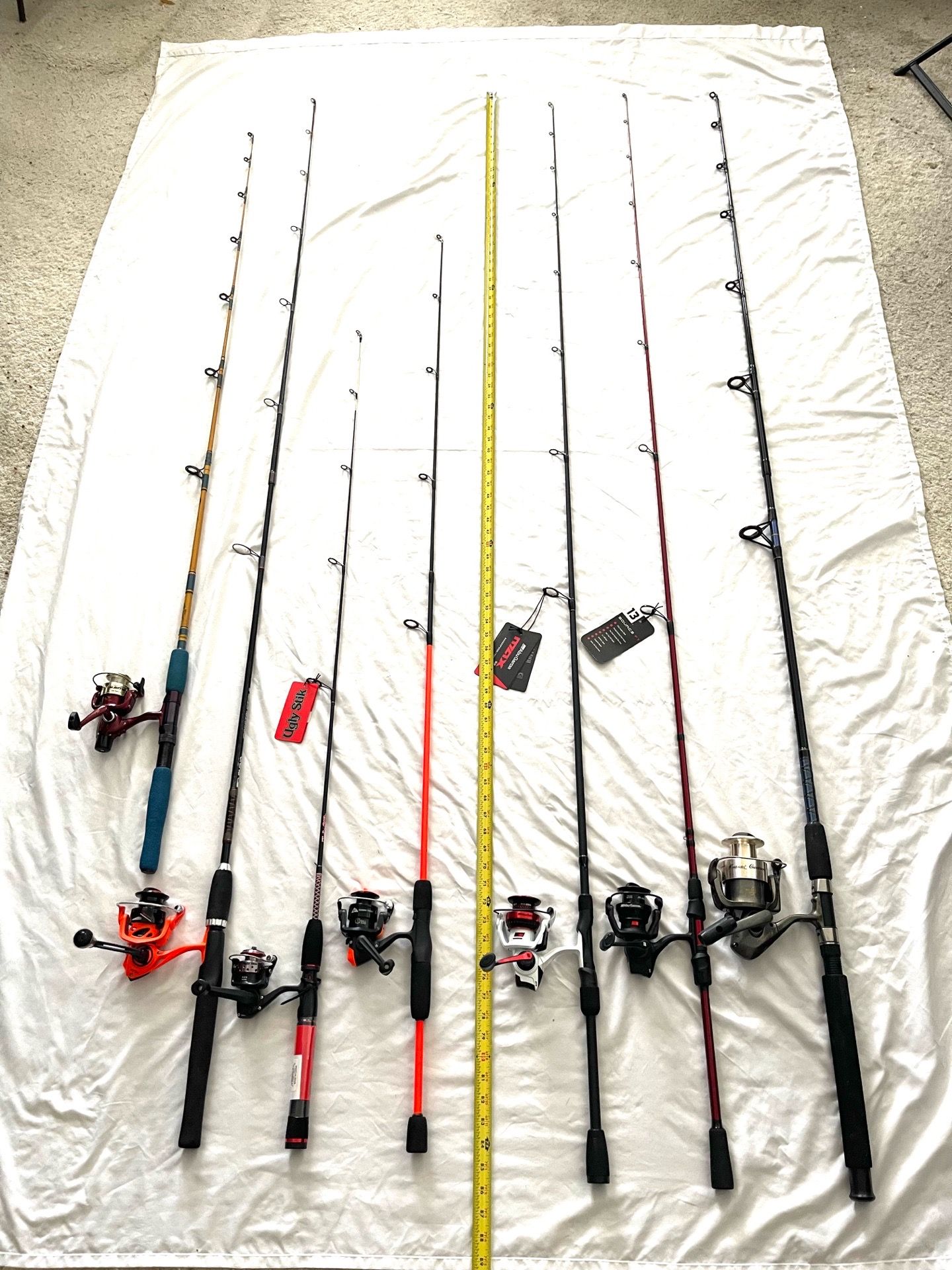Brand new and preowned fishing rod and spinner fishing reel combos. $450 for everything.
