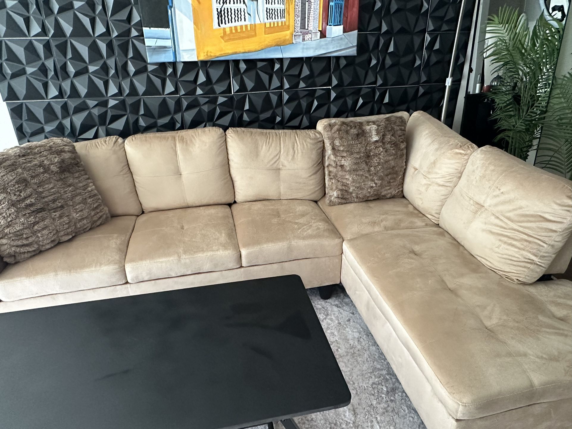 Tan Sectional And Black Coffee Table Set