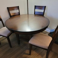 4 Chsirs And 42" Round Table