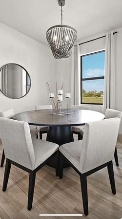 From Stage Model Home.Beautiful And New Dinning Table 6 Chairs.