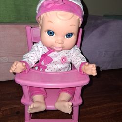 Baby Doll On A High Chair 