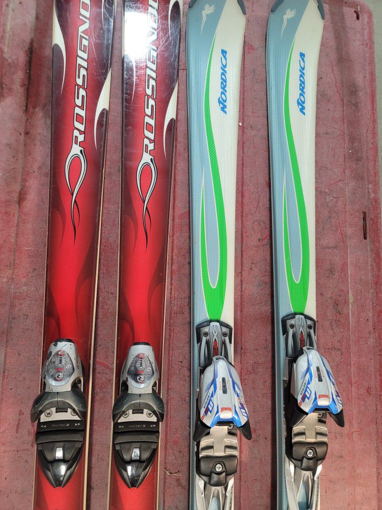 2 Sets Of  Skis With Bindings