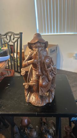 vintage hand-carved wood folk art figurine. 13 inches tall