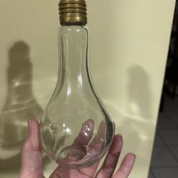Glass lightbulb shaped bottle