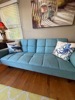 Mid Century Modern Teal Tufted Fabric Futon with Wood Legs