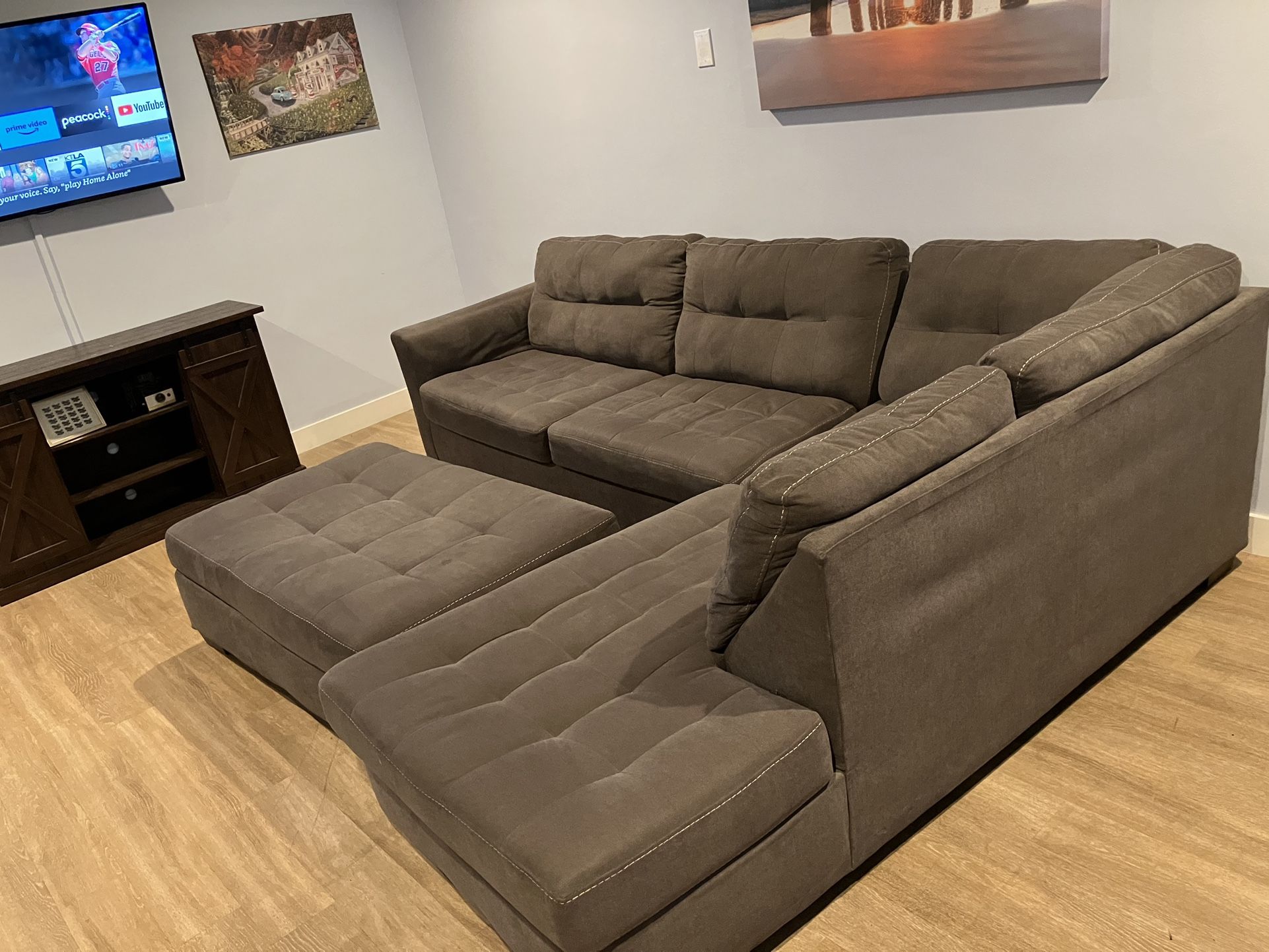 Gray sectional with Ottoman 