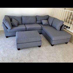 Gray sectional with ottoman