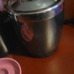 vintage Casanova ice bucket and bar accessories set. 
The set includes two stainless steel cocktail shakers and two black ice buckets, one with a lid.