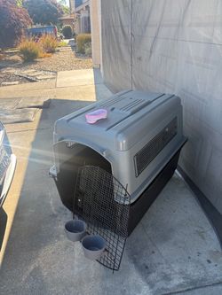 Large kennel up to 80 pounds good condition