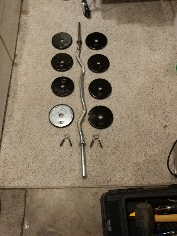 Curling Bar, Clamps and 40 lbs Steel Discs