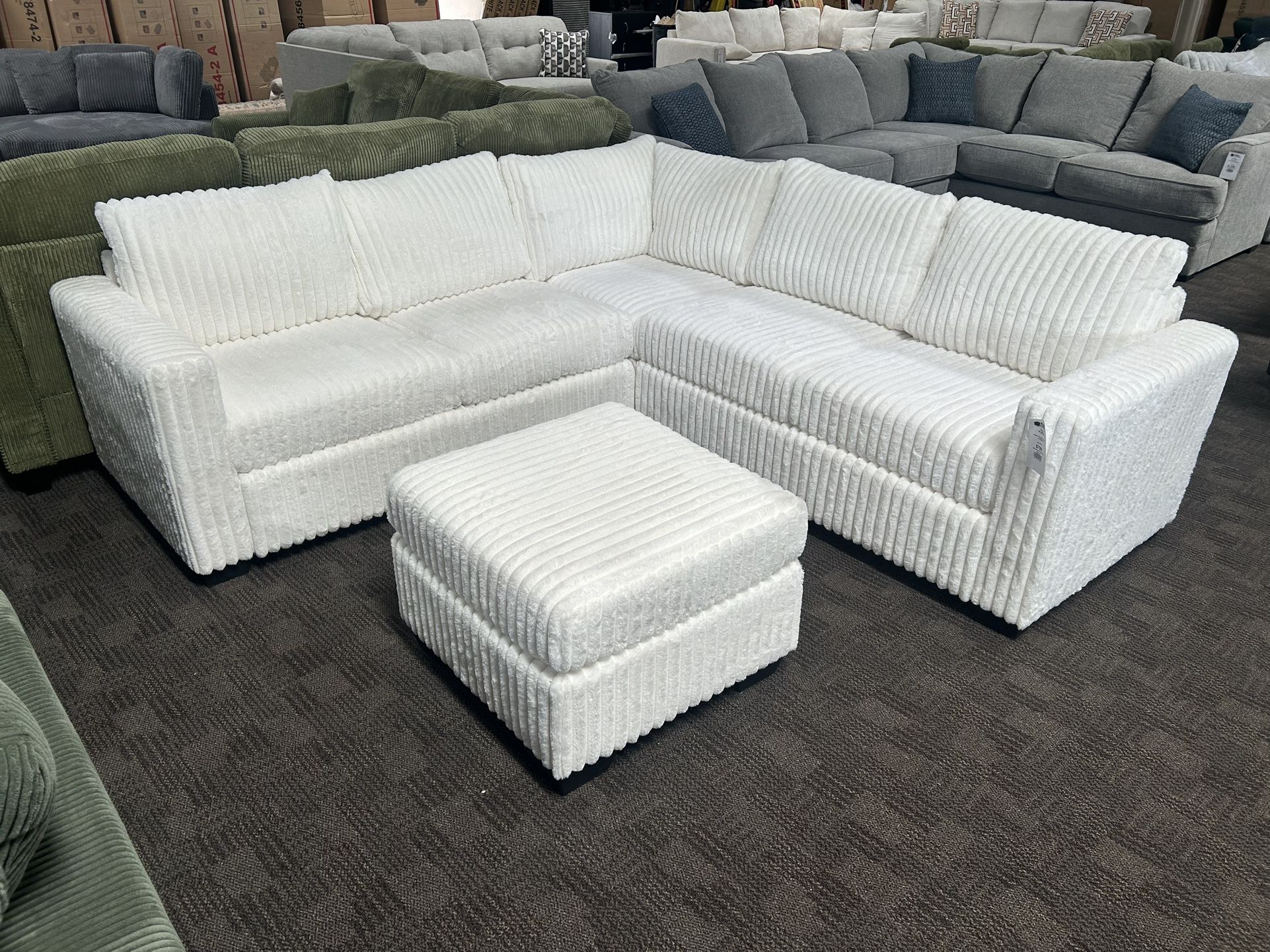 White Ivory Sectional And Ottoman