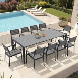 95 in Large Rectangular Patio Table Rust Proof with 10 chairs.