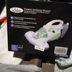 Portable Sanitizing Vacuum