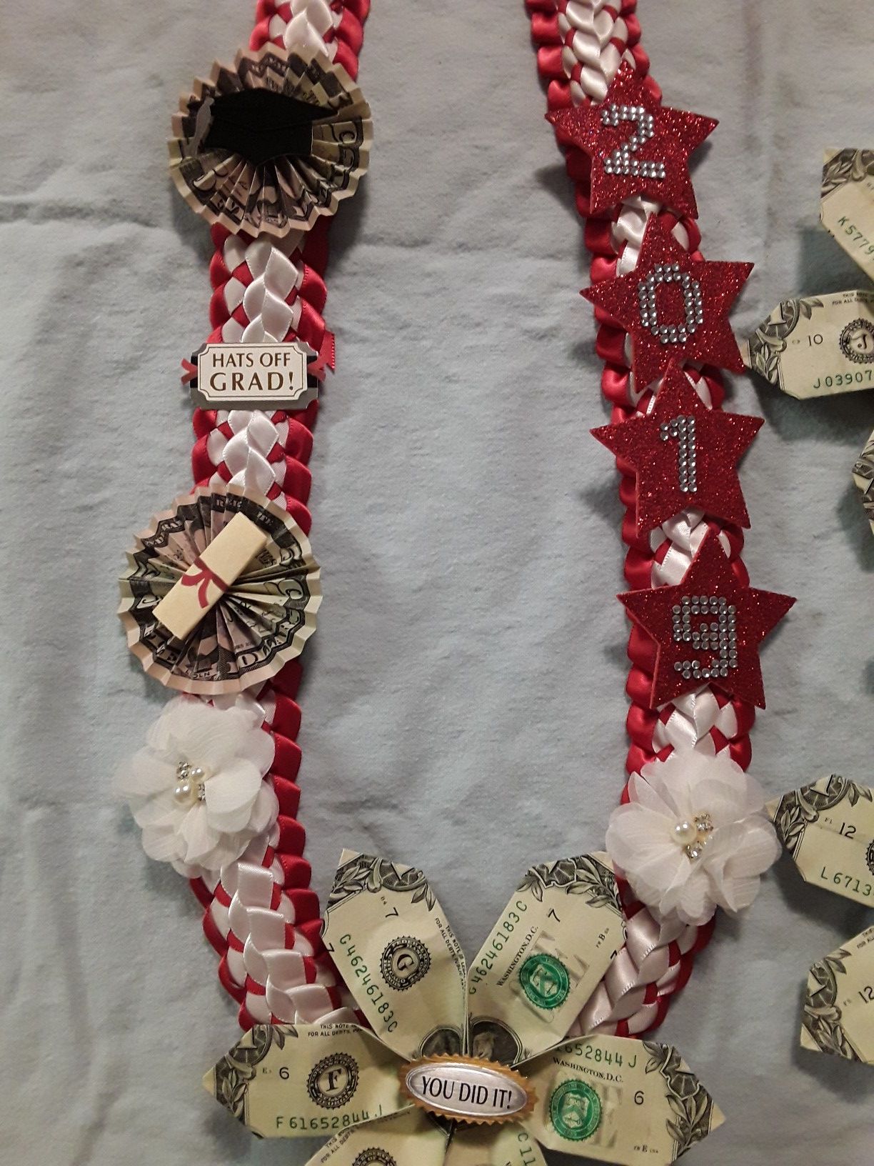 collares de graduación. $30 más dinero...