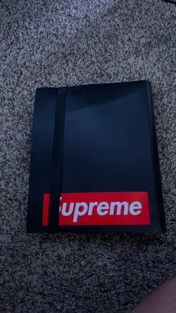 Binder of basketball and foot ball cards