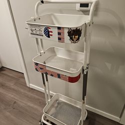 Metal shelving cart / shelf with wheels
Can be just white, without stickers 