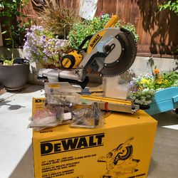 Dewalt Brand New 15 Amp Corded 12 in. Double Bevel Sliding Compound Miter Saw, Blade Wrench and Material Clamp.(Firm on price)