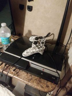 Ps3 with controller and 7 games