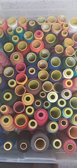 Over 120  spools of polyester Thread Comes With Cases