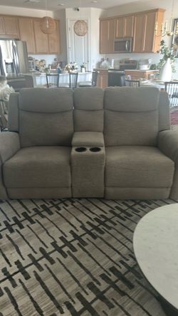 Light brown dual reclining sofa