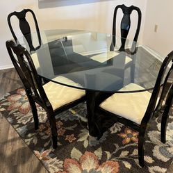 Glass And Black Dining Room Set.  