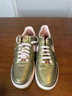 Nike Air Force 1s in metallic gold and white 